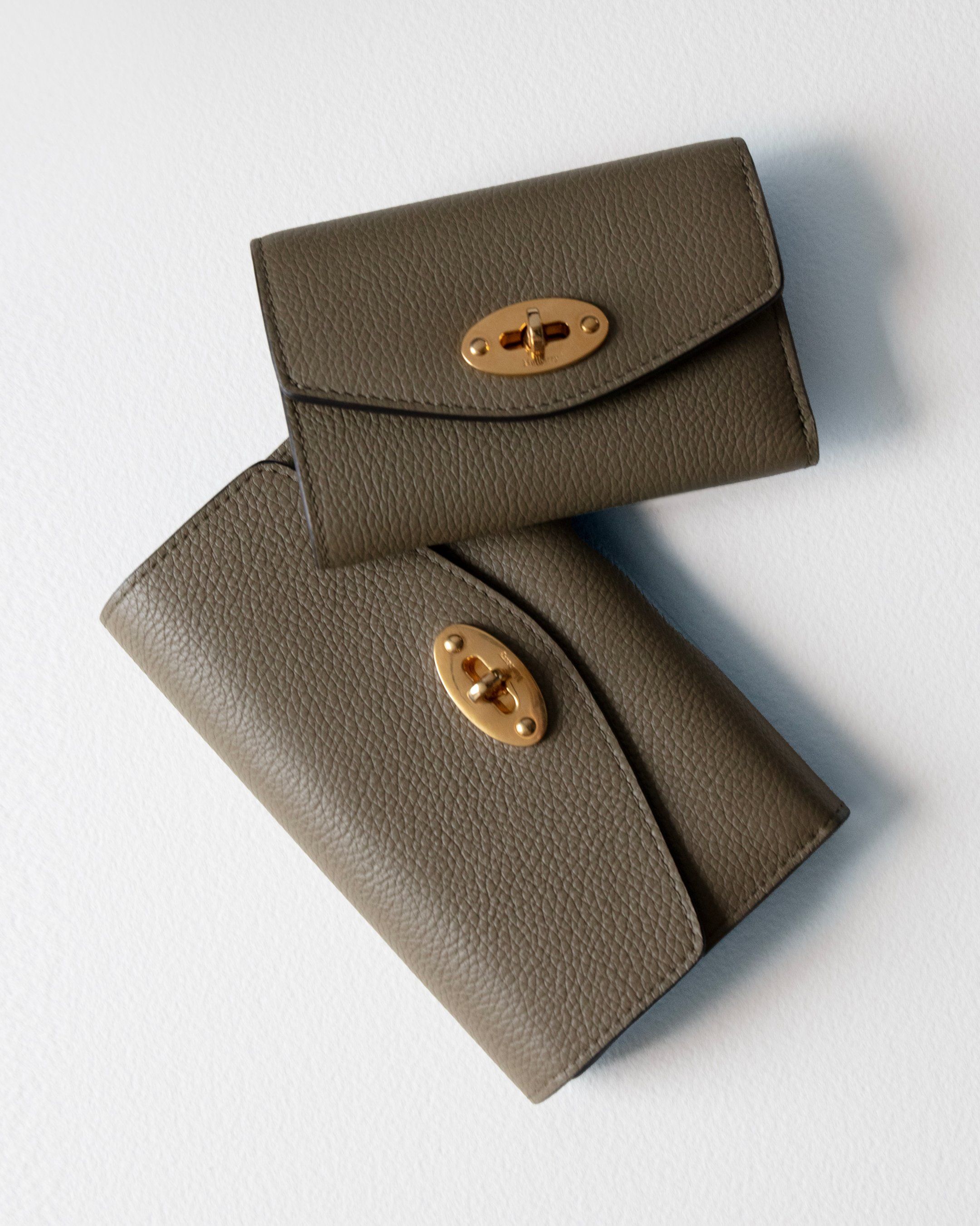Two Mulberry Darley wallets in linen green leather